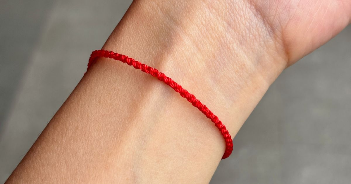 The Red String: A Symbol of Protection, Faith, and Connection - Earth ...